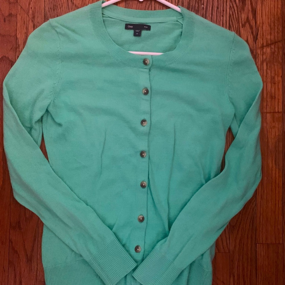 XS mint green GAP cardigan in “mint condition.”  Worn once. I’m too big now.